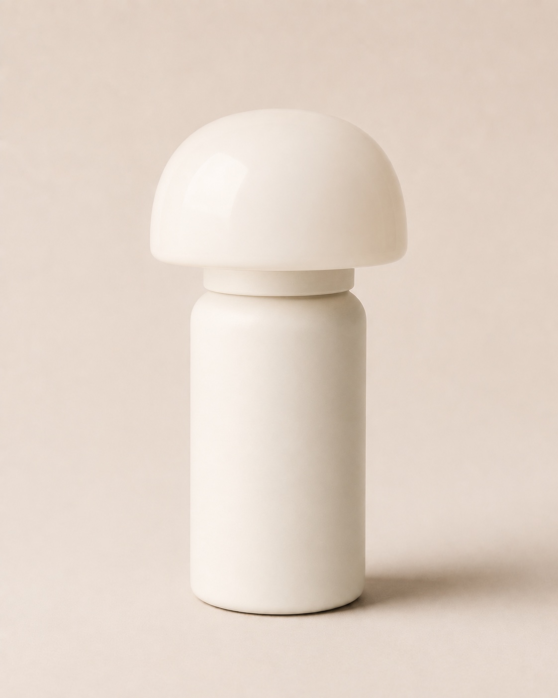 Chalk Column Table Lamp with an illuminated opal-glass shade